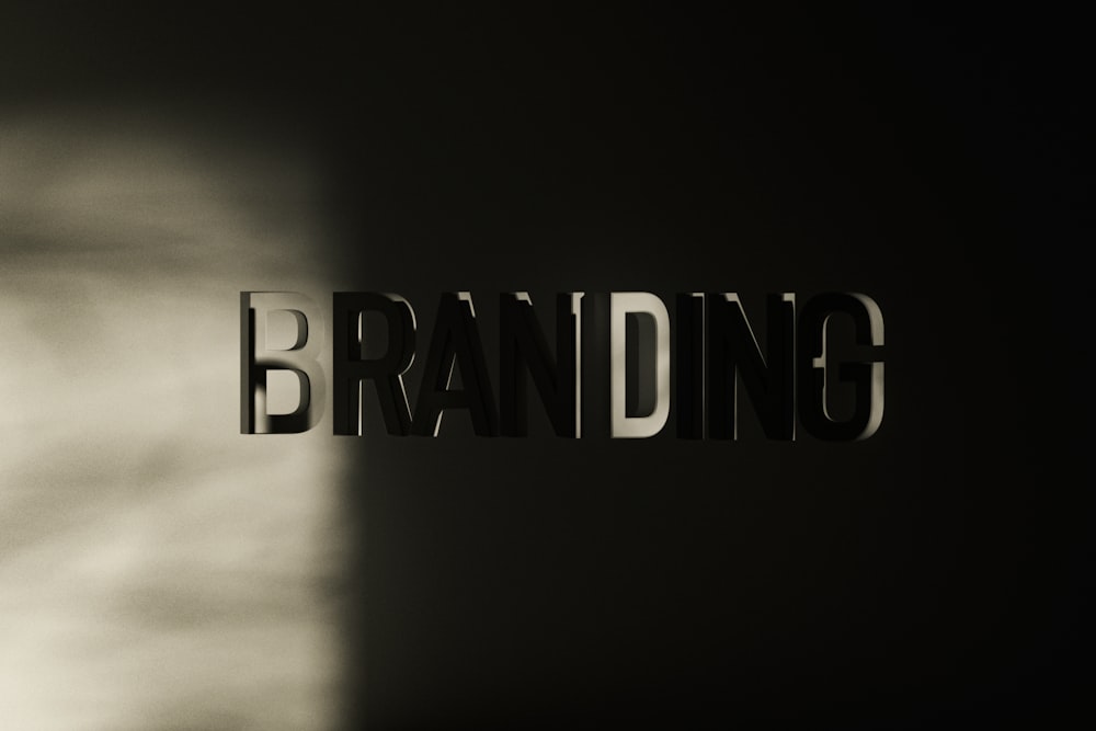 a black and white photo of the word branding