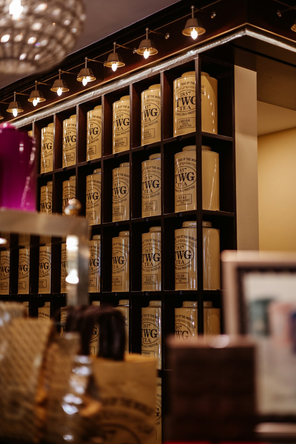 a room filled with lots of bottles of liquor