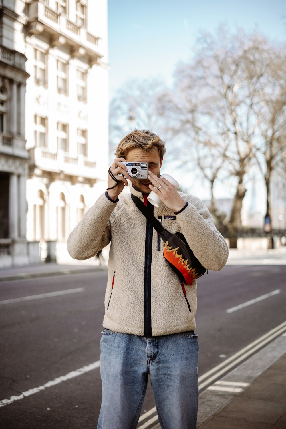 a man taking a picture of himself with a camera