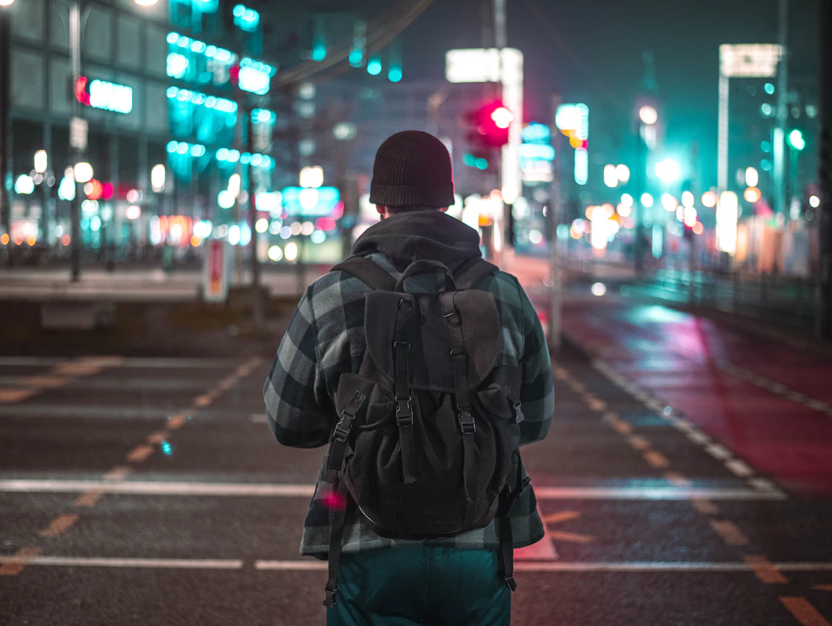 Confident traveler with backpack exploring a safe urban destination
