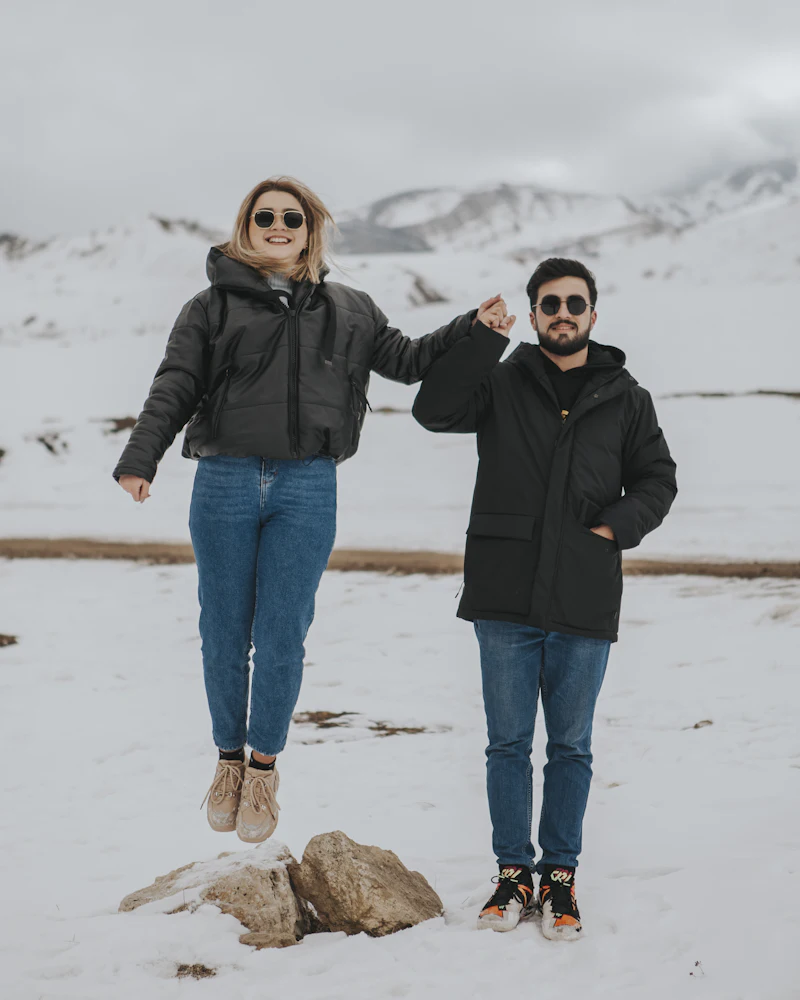 Couple standing in the snow at Shahdag