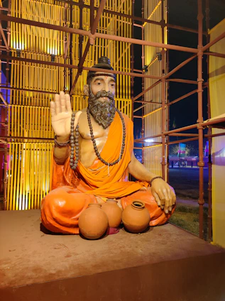 A warm portrait of the founder sitting peacefully in a sunlit Bali garden, embodying calm and openness.