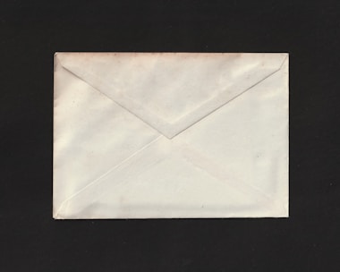 A close-up of a secure envelope with a label ready for dispatch.