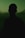 a silhouette of a man in the dark