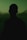 a silhouette of a man in the dark