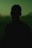 a silhouette of a man in the dark