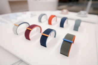 a bunch of different colored bands on a table