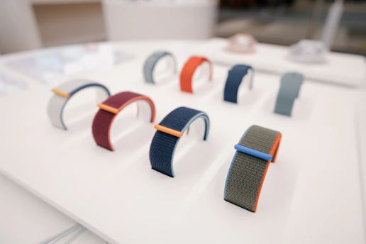 a bunch of different colored bands on a table