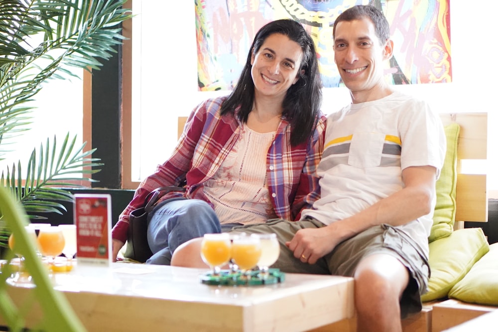 a man and a woman sitting on a couch