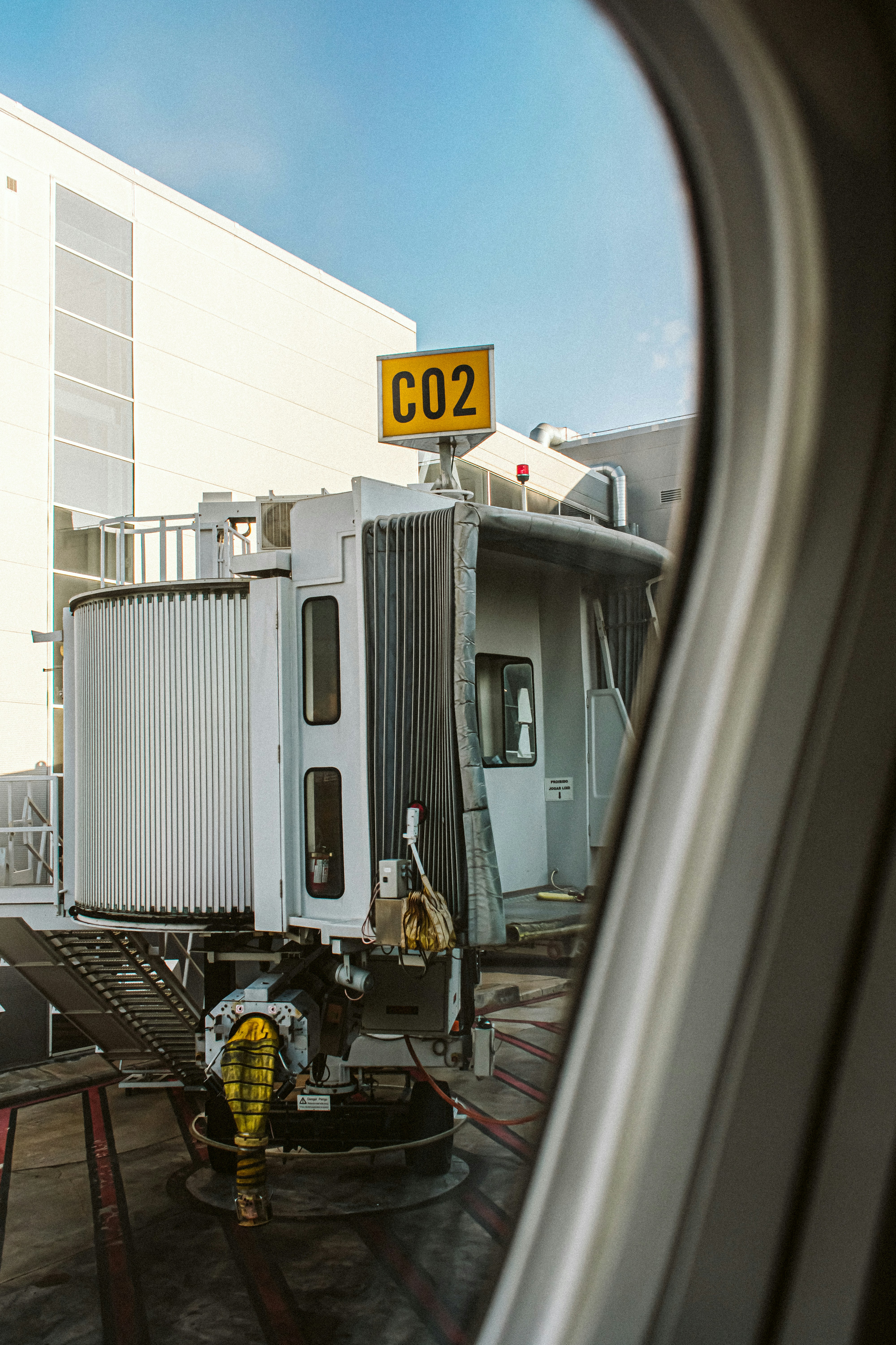 a view of a truck from inside an airplane window
