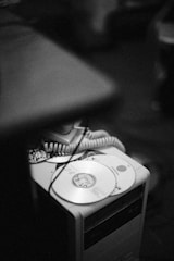 Stacks of DVDs and digital devices ready for distribution.