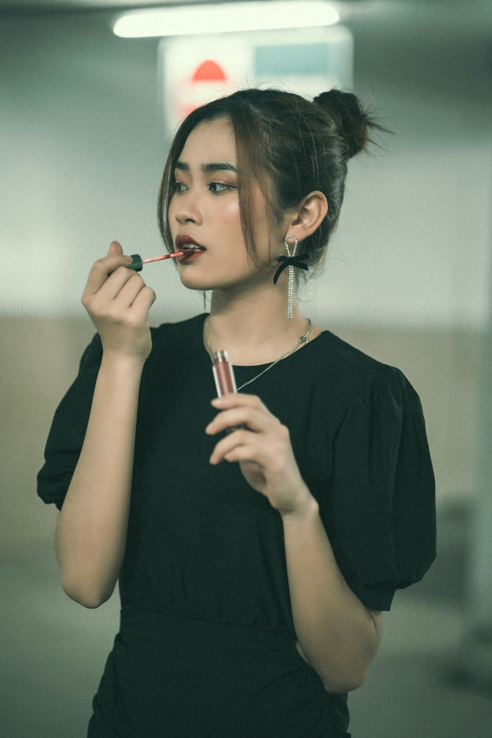 a woman with a cigarette in her mouth