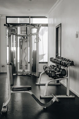 a black and white photo of a gym