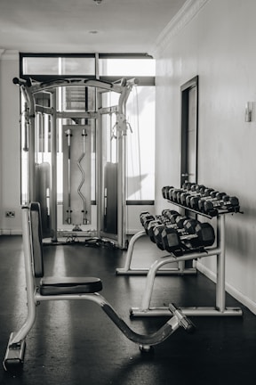 a black and white photo of a gym