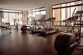 a gym with treadmills and exercise machines