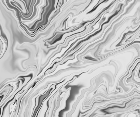 A minimalist black and white marble rolling gently across a smooth surface, symbolizing steady momentum.