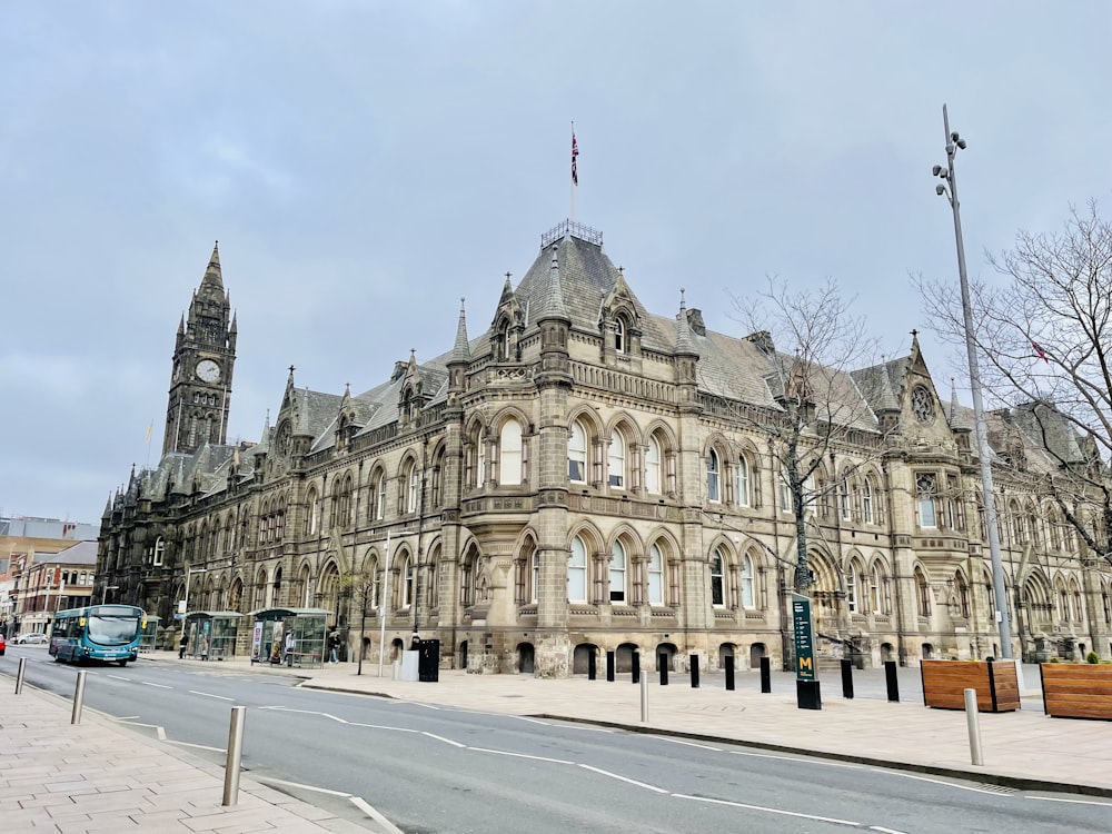 a large stone building with a clock tower