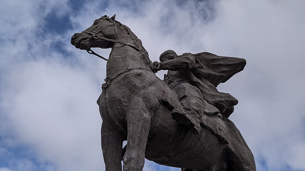 a statue of a man riding a horse