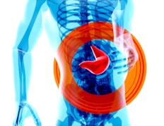 a man with a stomach pain in the shape of a circle