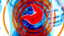 A stylized, abstract representation of a human stomach in bright red against a backdrop of circular blue and orange radiating patterns. The composition includes outlines of human hands in a blue hue, suggesting a gesture or focus towards the stomach.