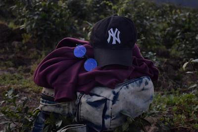 Exclusive Boss O.G.G. merchandise display featuring stylish hoodies and caps.