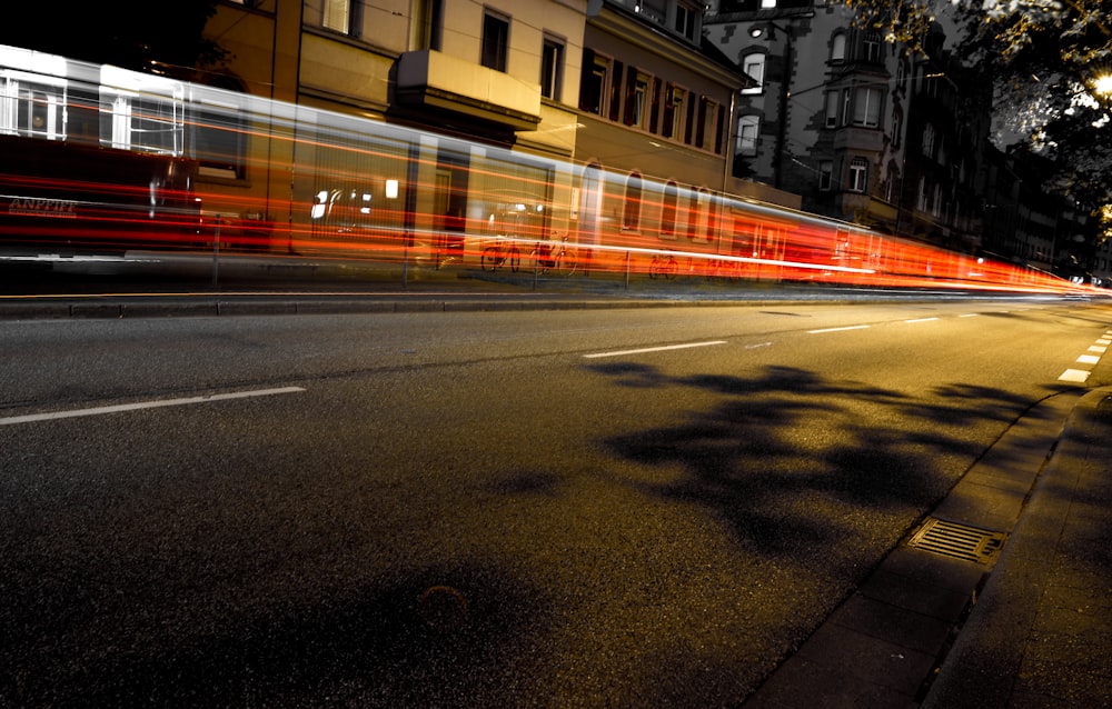 a blurry photo of a city street at night