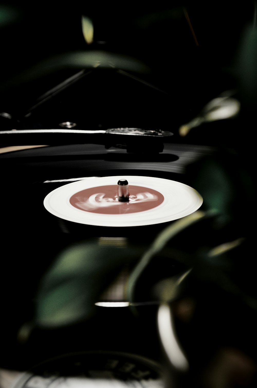 a record player with a white disk on top of it