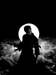 A silhouetted figure stands prominently against a backdrop of a bright, circular light. The character holds two swords and is likely a warrior or samurai, depicted in an action-ready pose. The background features swirling patterns reminiscent of smoke or mist.
