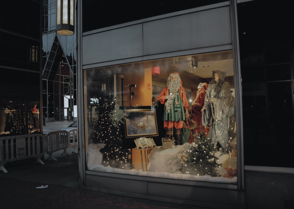 a store window with a christmas display in it