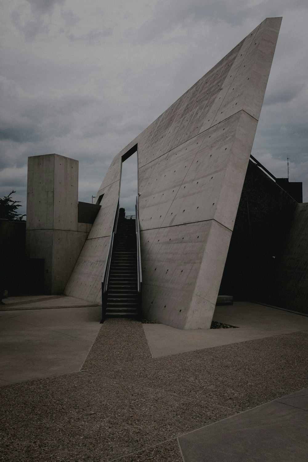 a concrete structure with stairs leading up to it