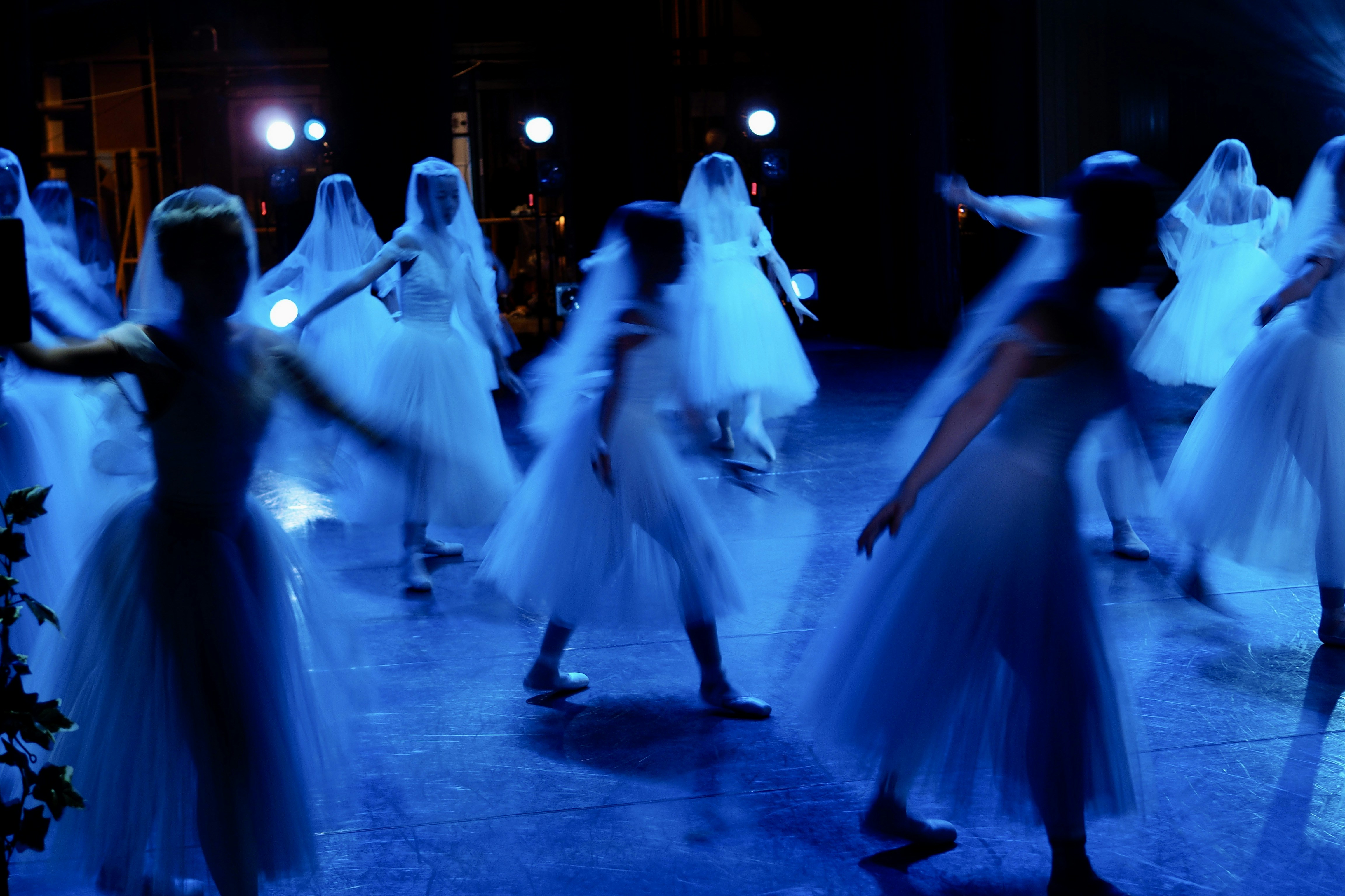 a group of people in a dark room