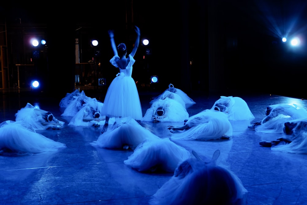 a group of people in a dark room