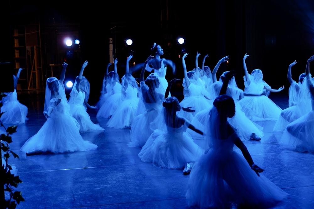 a group of people performing on a stage