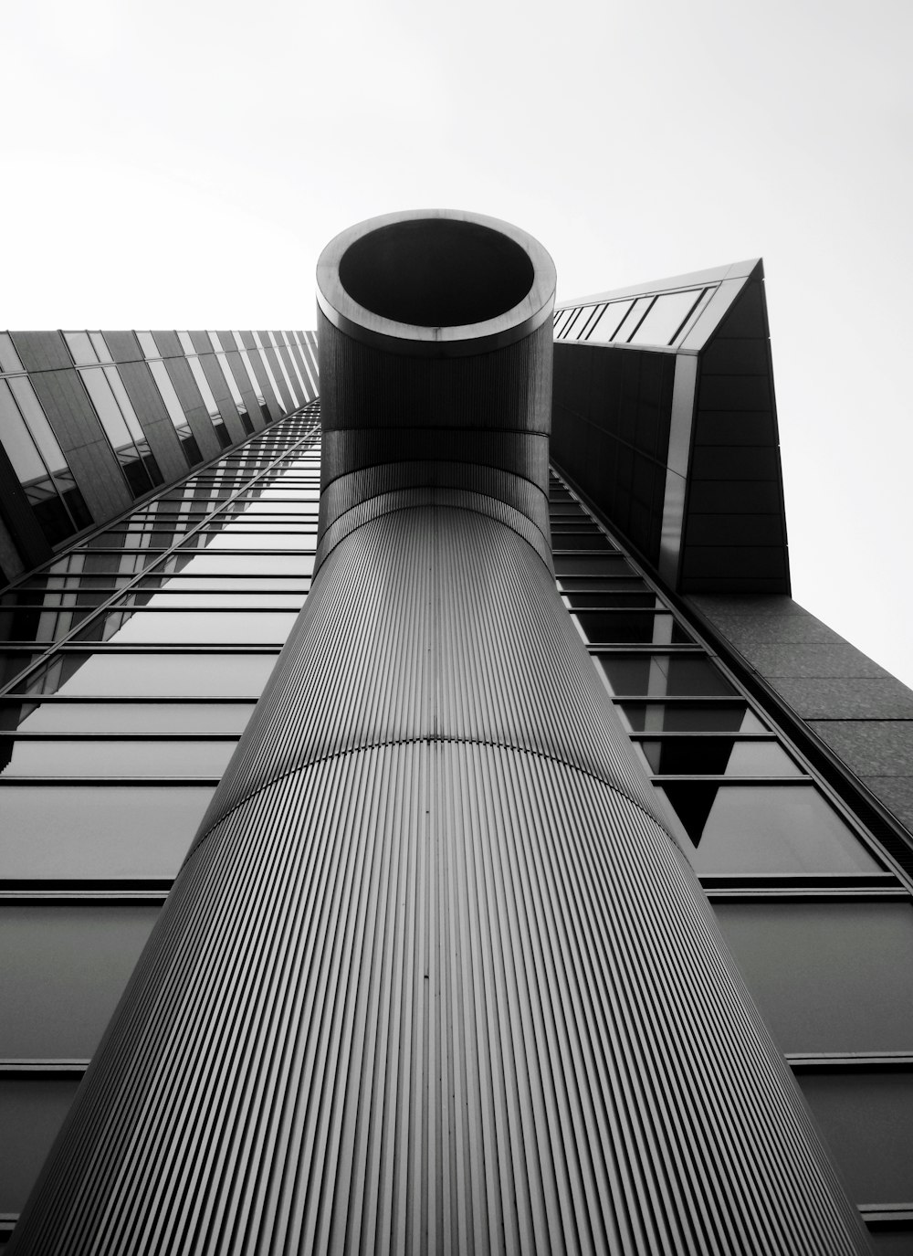 a black and white photo of a tall building