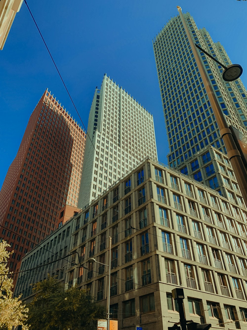 a group of tall buildings sitting next to each other