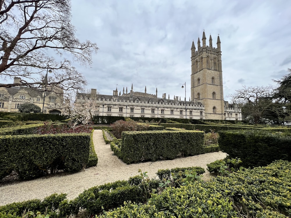 a large building with a clock tower in the background