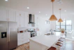 Bright kitchen with stainless steel appliances and a large island perfect for entertaining.