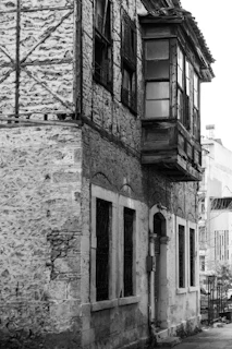 Historic stone facade of the building blending timeless charm with modern comfort.