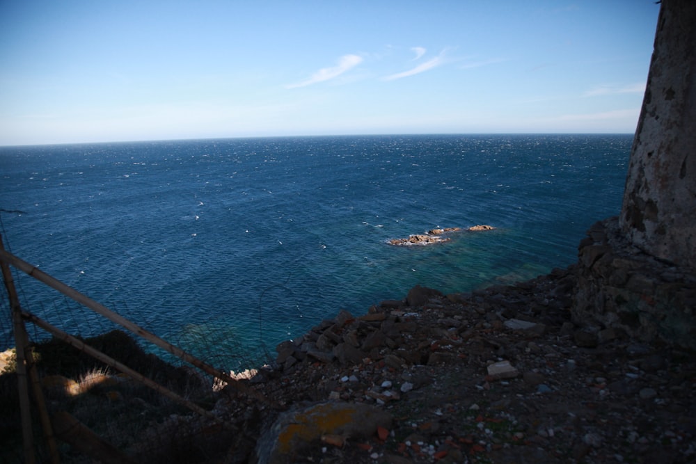 a view of a body of water from a cliff