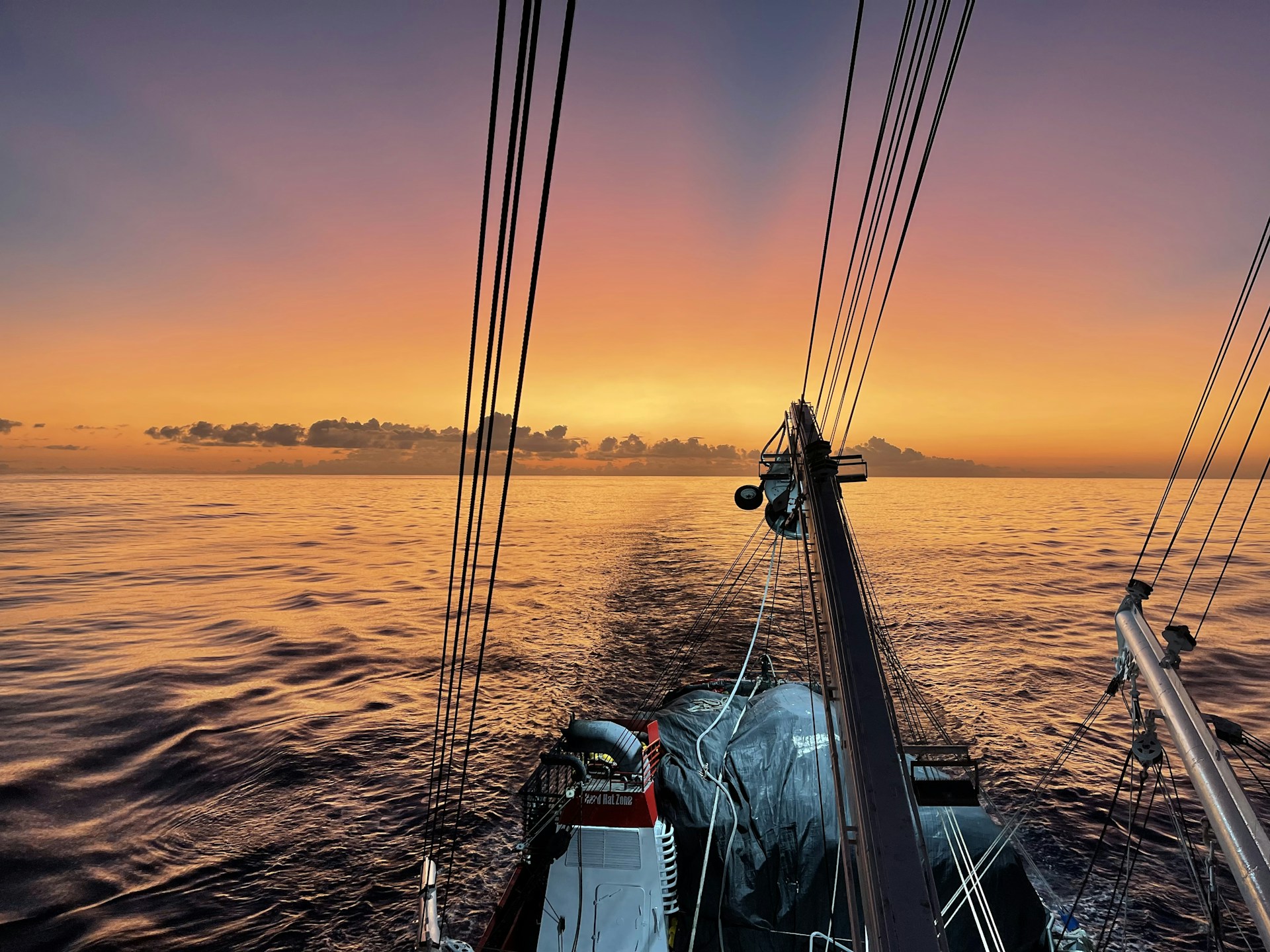 woman wearing yellow long-sleeved dress under white clouds and blue sky during daytime