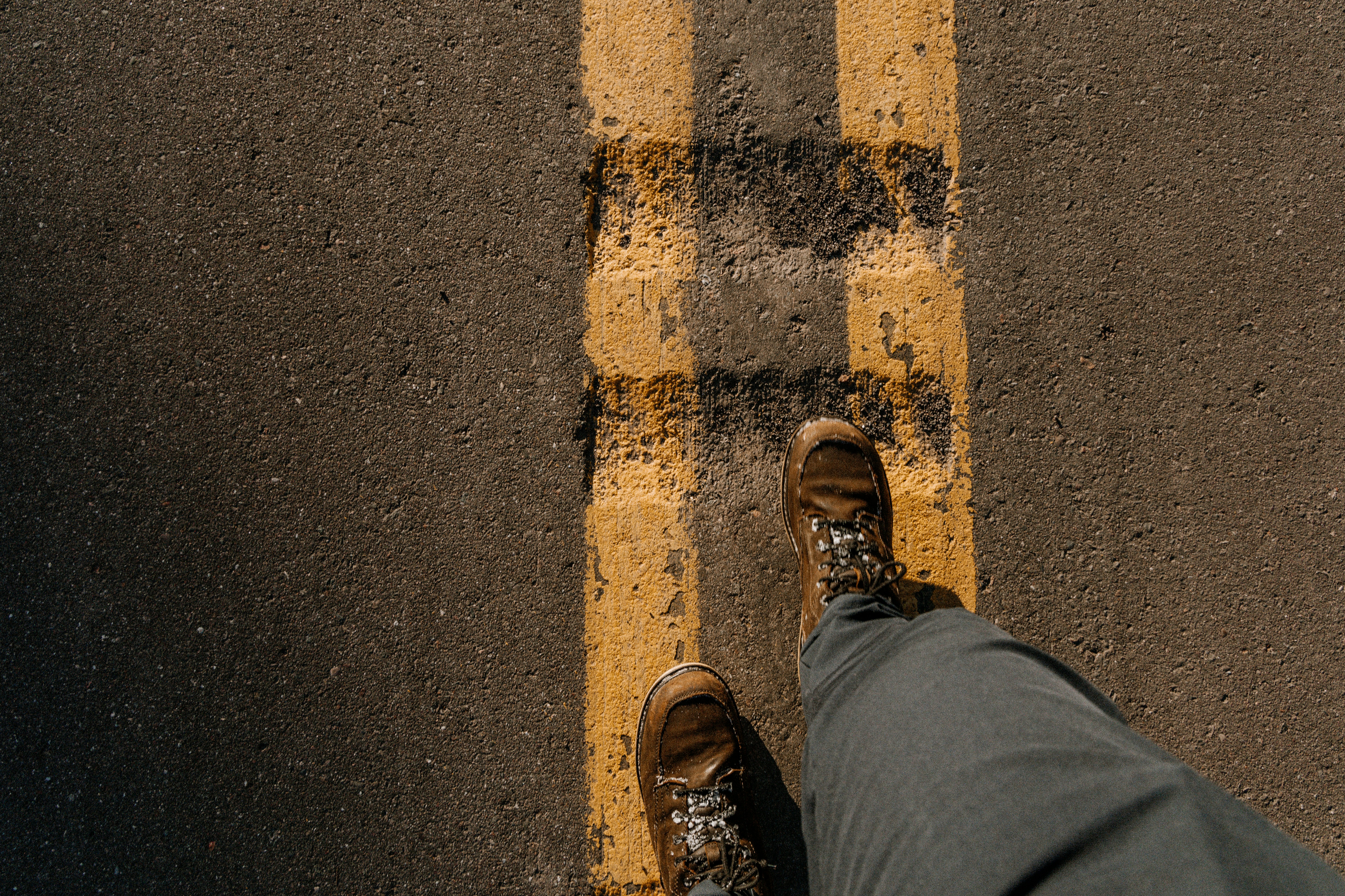 a person standing in the middle of a street