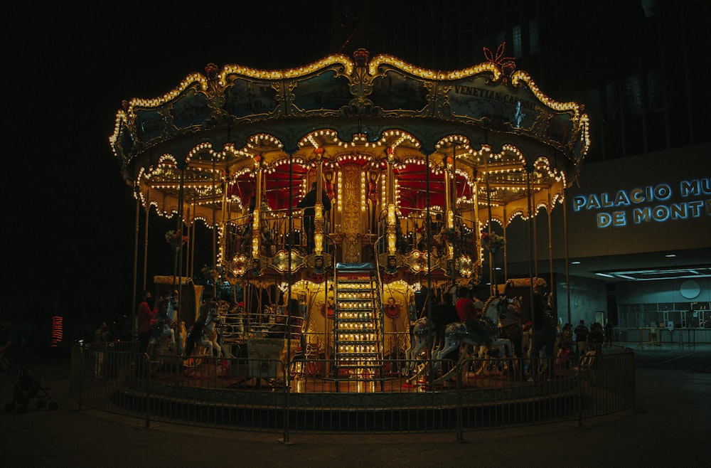 a merry go round at night with lights