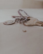A set of house keys on a table.