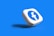 a white dice with a blue facebook logo on it