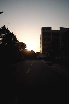 A serene urban scene captured in soft evening light, showing subtle colors.
