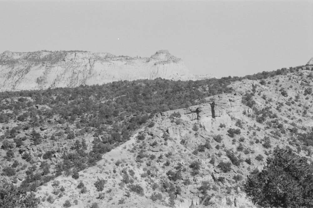 a black and white photo of a mountain range