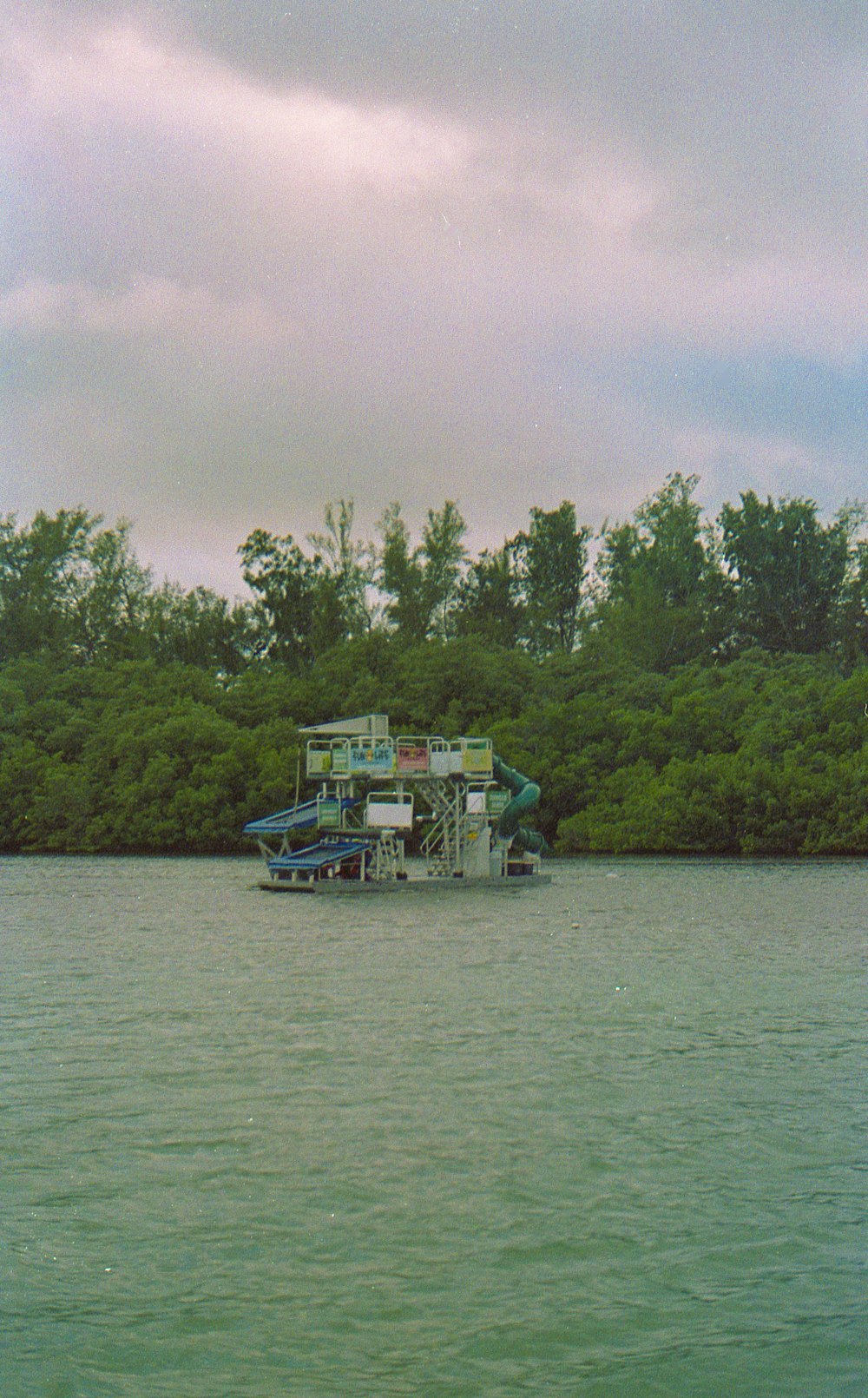 a large boat floating on top of a body of water