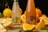 Two bottles of Sanpellegrino drinks placed on a wooden surface are surrounded by sliced lemons and oranges. The setting is vibrant, showcasing the citrus fruits prominently. The bottles have distinct labels, and the image composition suggests a fresh and natural theme with an artistic touch of blurred background.