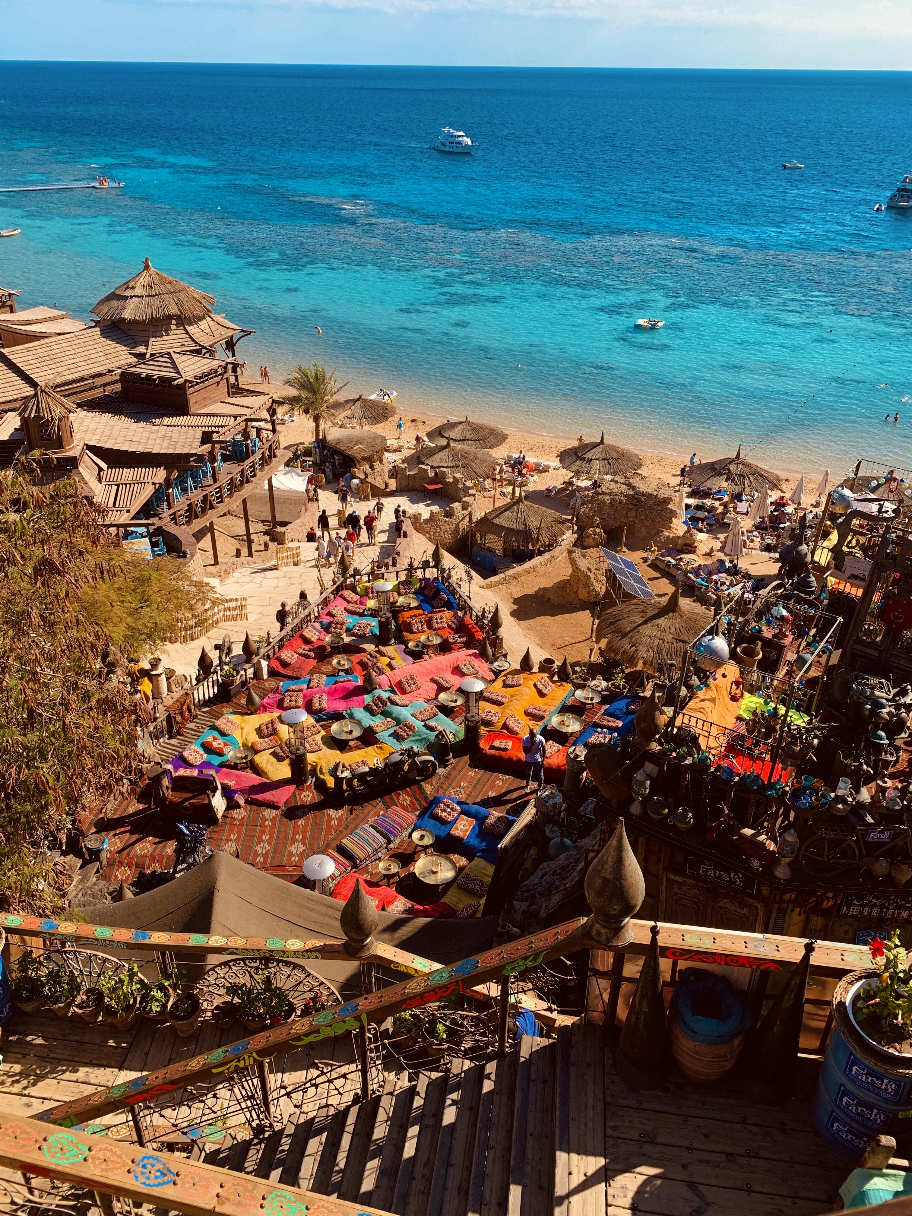 a bunch of umbrellas that are on a beach