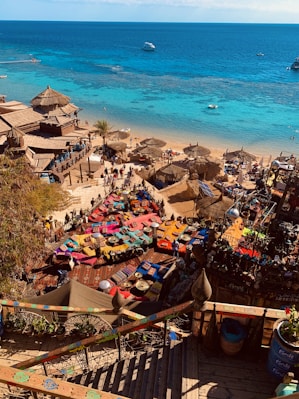 a bunch of umbrellas that are on a beach